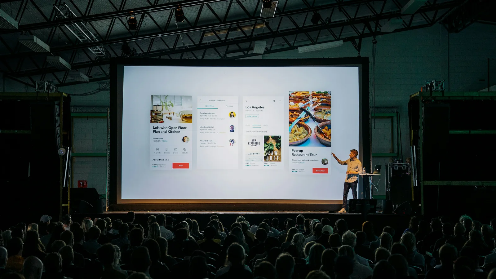 Presenter revealing a new product on a big screen, the key moment in this product launch event case study in Singapore